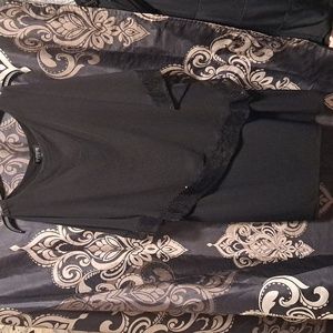 Unfocused studio black dress slit sleeves asymmetrical design